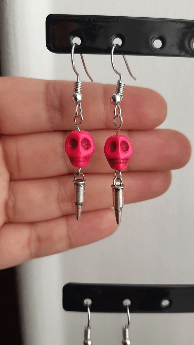 Boucle d'oreille crâne/munition