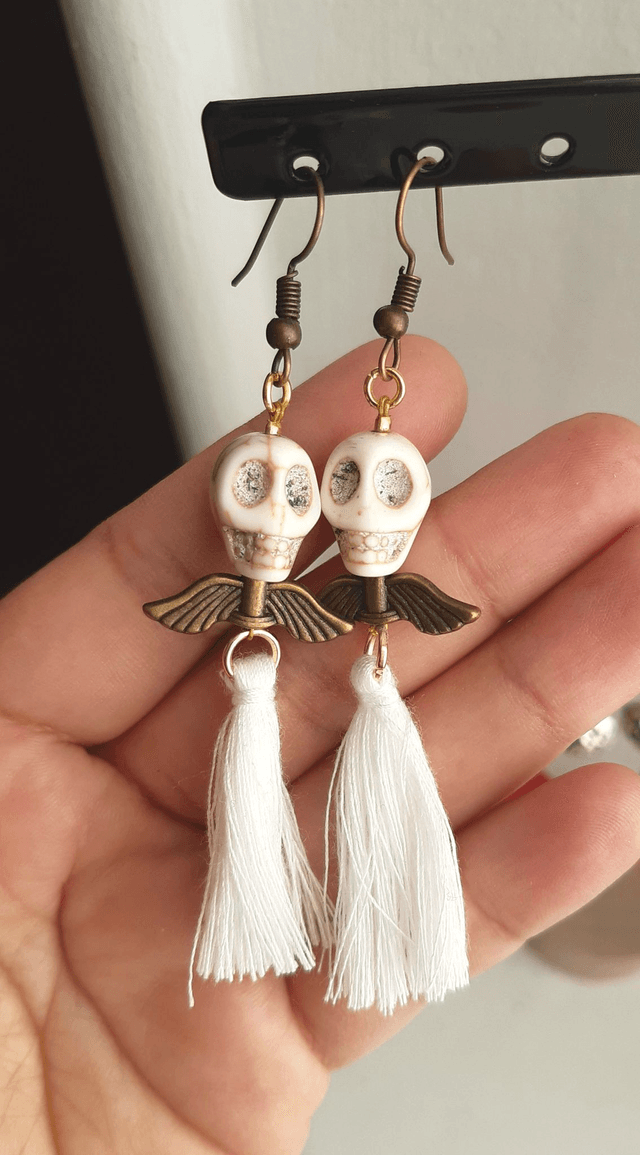 Boucle d'oreilles Santa Muerte ailées