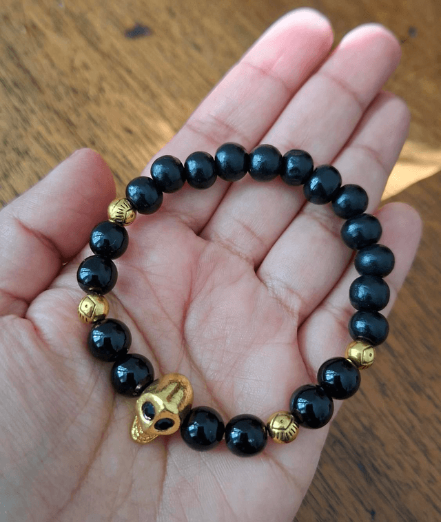 Bracelet Santa Muerte noir crâne doré