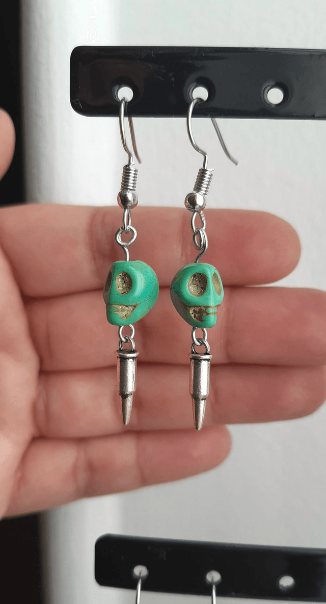 Boucle d'oreille crâne/munition